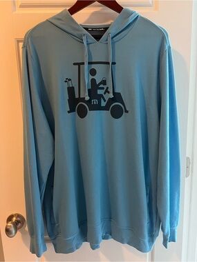 Travis Mathew Light Blue Hoodie with Black Golf Cart Graphic